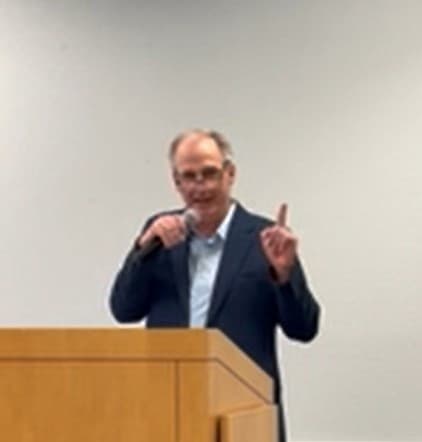 Tim Hughes speaking at the North Greenwood solar celebration